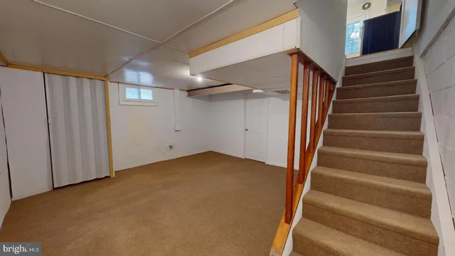 a view of an entryway with stairs