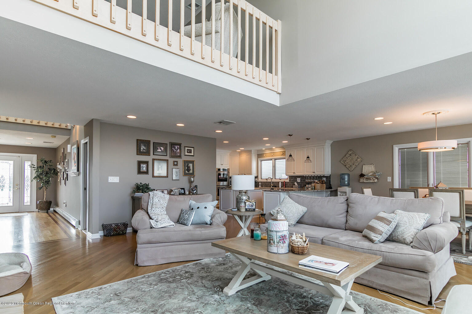 356 Silver Bay Road Toms River, NJ 08753 - Photo 18 of 41 a living room with furniture or kitchen view and a wooden floor