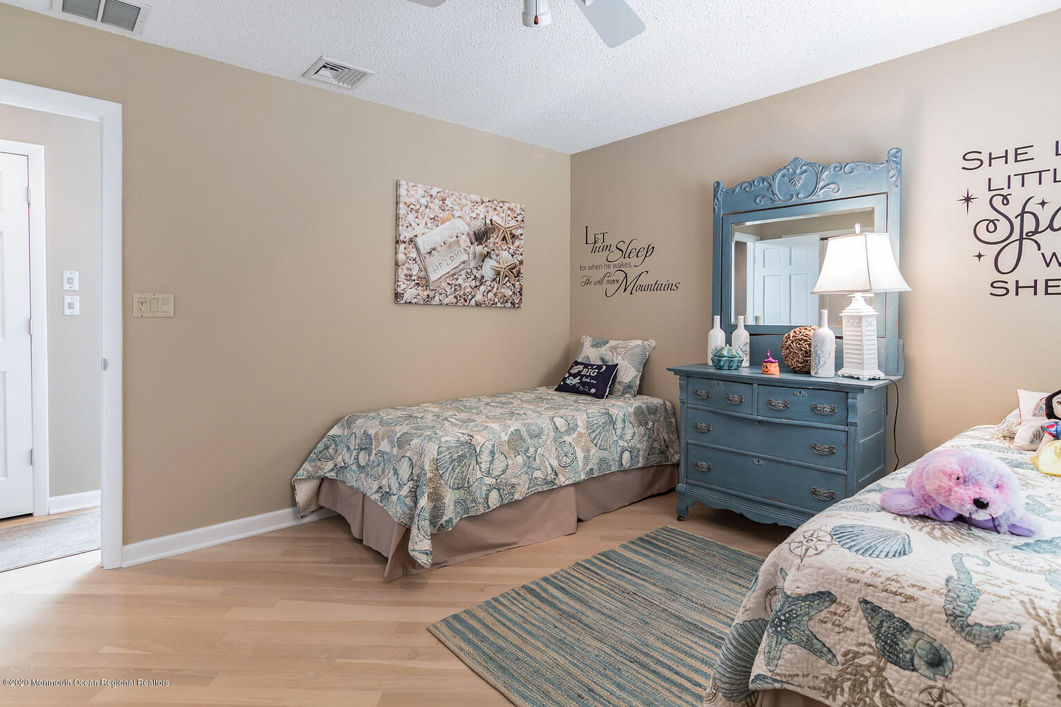 356 Silver Bay Road Toms River, NJ 08753 - Photo 24 of 41 a bedroom with a bed and wooden floor