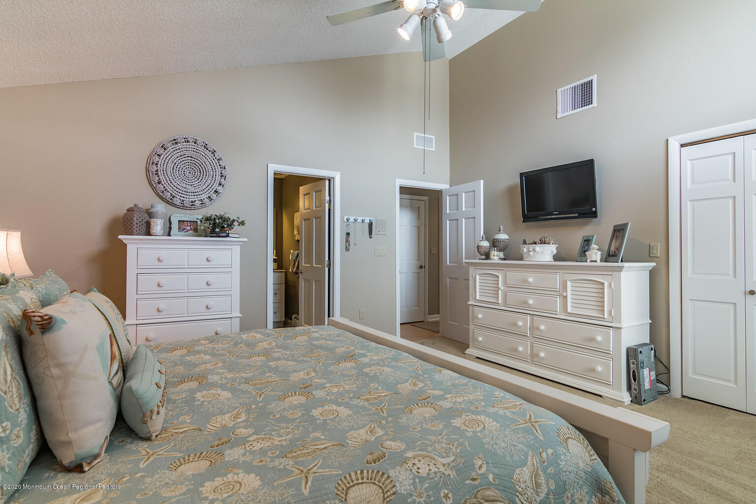 356 Silver Bay Road Toms River, NJ 08753 - Photo 26 of 41 a bedroom with a bed and flat screen tv