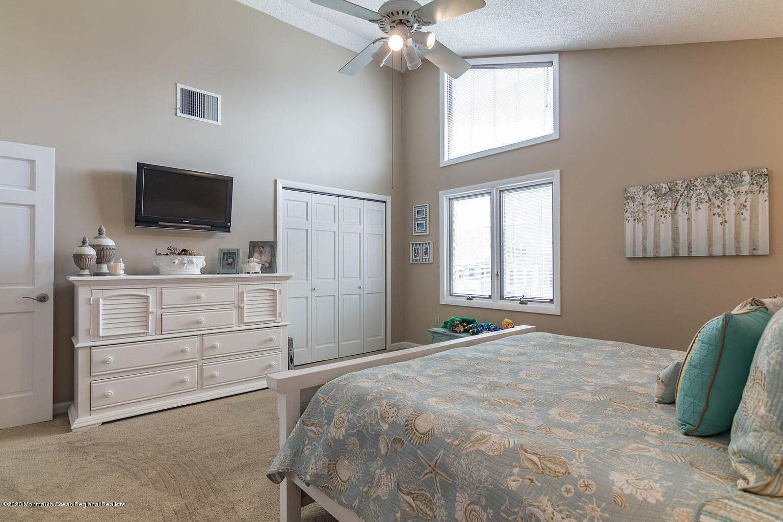 356 Silver Bay Road Toms River, NJ 08753 - Photo 27 of 41 a bedroom with a bed and a flat screen tv
