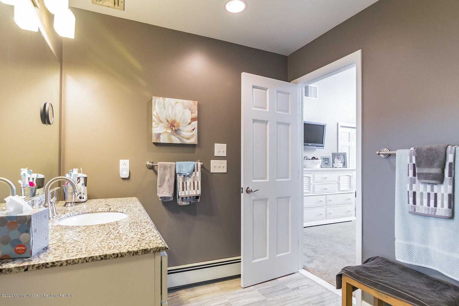 356 Silver Bay Road Toms River, NJ 08753 - Photo 29 of 41 a bathroom with a sink and a mirror