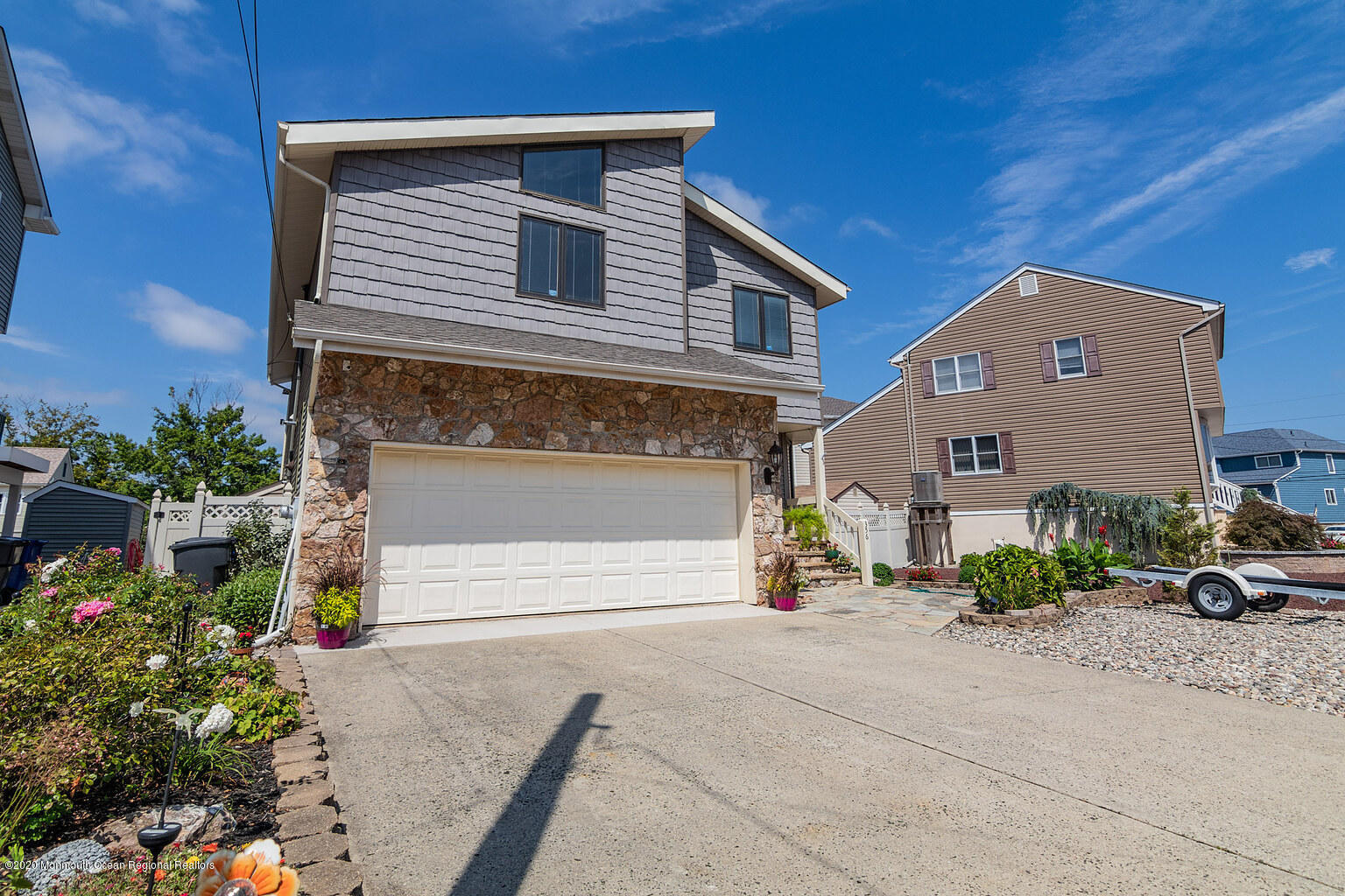 356 Silver Bay Road Toms River, NJ 08753 - Photo 3 of 41 front view of a house with a street