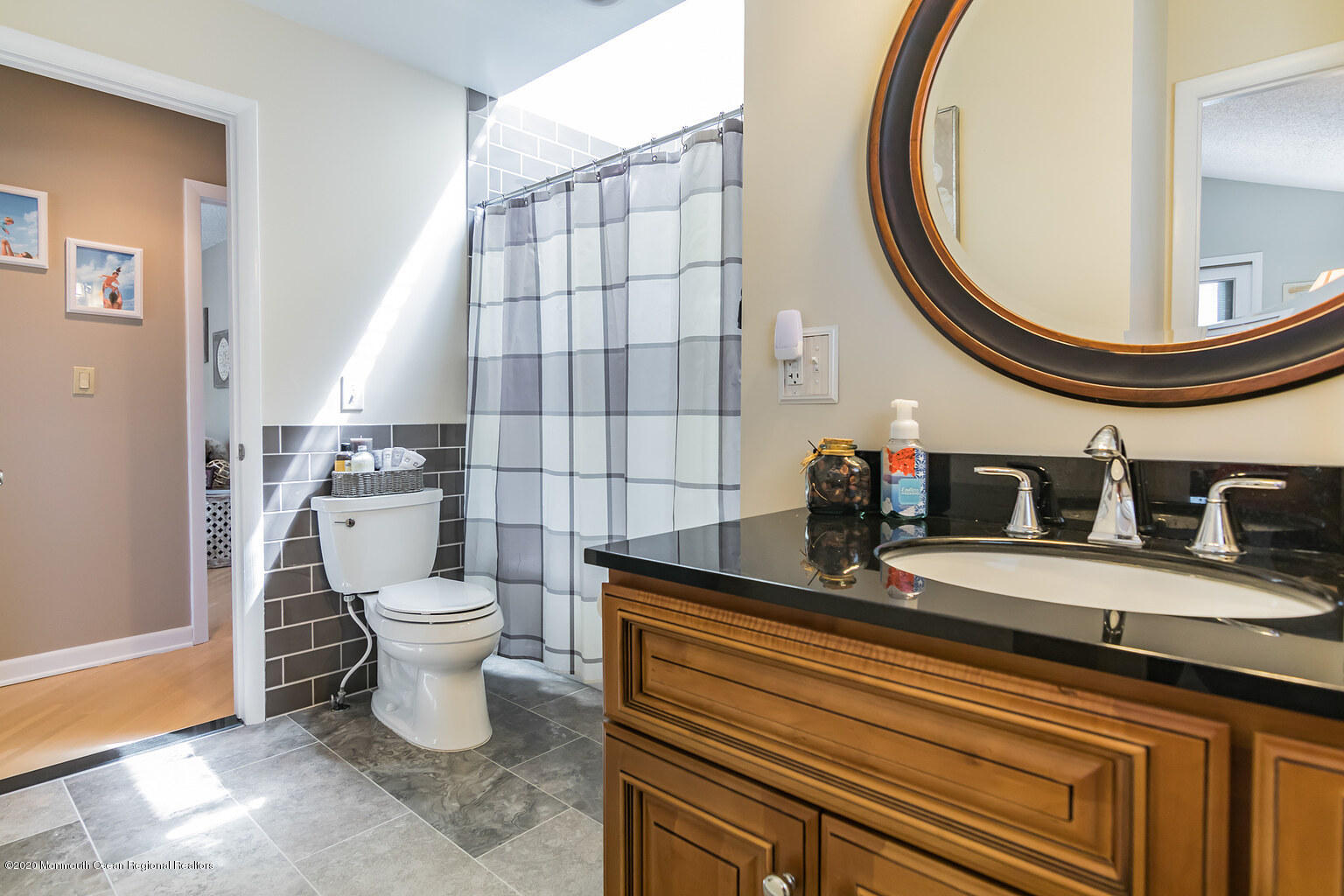 356 Silver Bay Road Toms River, NJ 08753 - Photo 31 of 41 a bathroom with a sink and a mirror