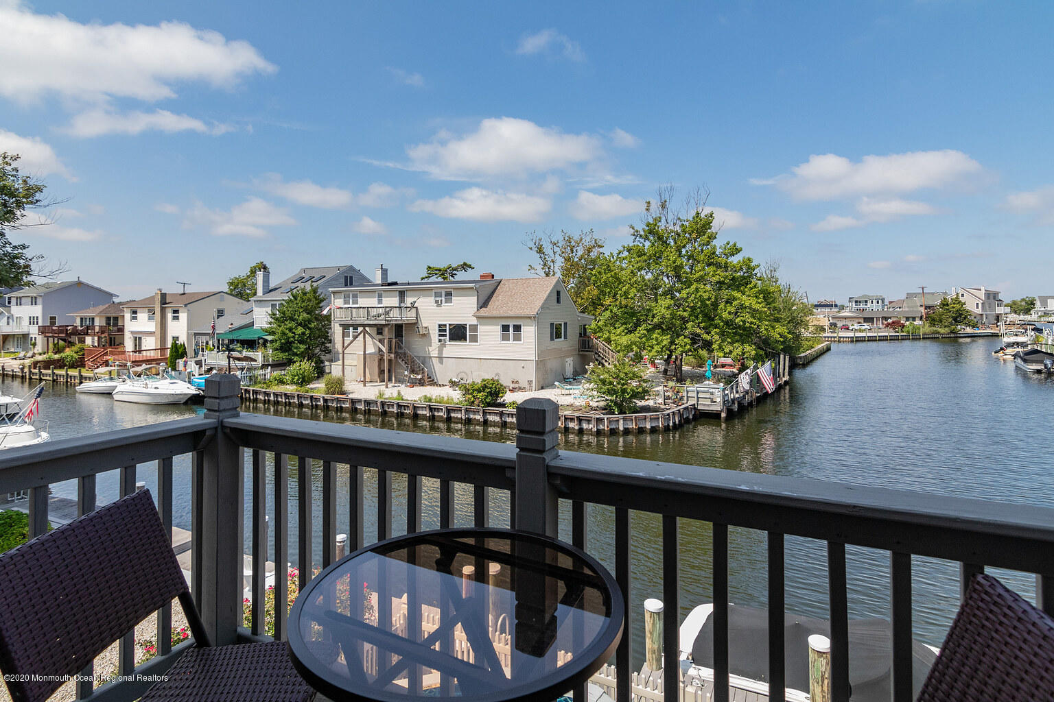 356 Silver Bay Road Toms River, NJ 08753 - Photo 33 of 41 a view of a balcony with wooden chairs