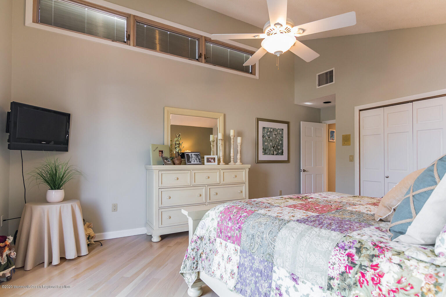 356 Silver Bay Road Toms River, NJ 08753 - Photo 34 of 41 a bedroom with a bed and a flat screen tv