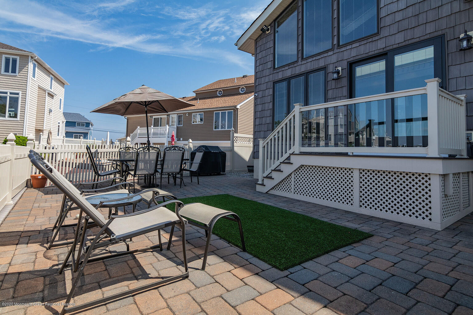 356 Silver Bay Road Toms River, NJ 08753 - Photo 36 of 41 a view of a patio with a table and chairs