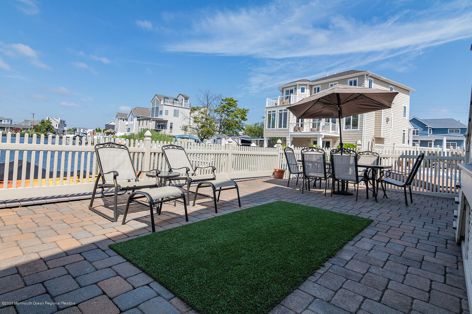 356 Silver Bay Road Toms River, NJ 08753 - Photo 37 of 41 a view of a chairs and table in backyard