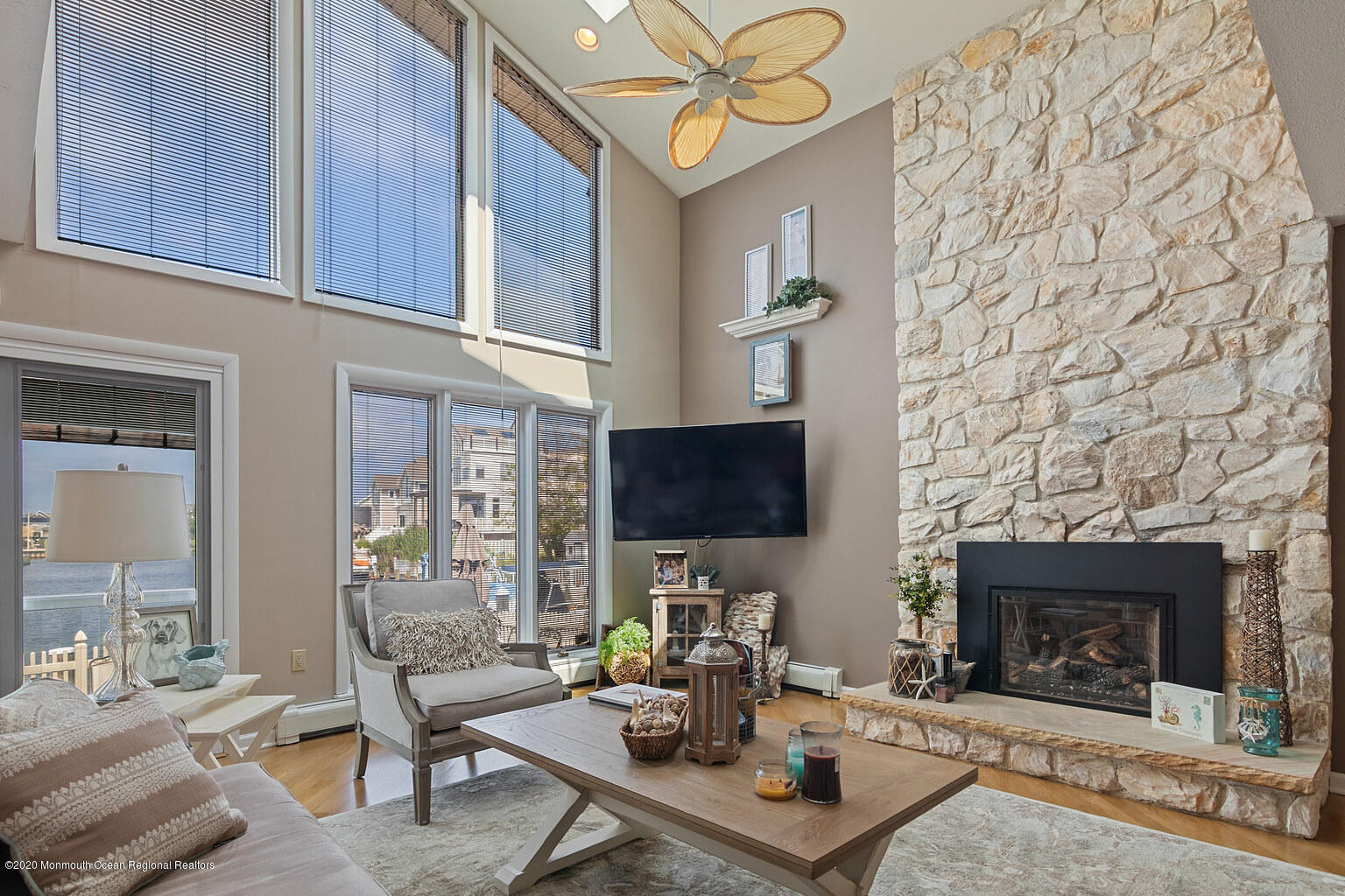 356 Silver Bay Road Toms River, NJ 08753 - Photo 8 of 41 a living room with furniture a fireplace and a flat screen tv