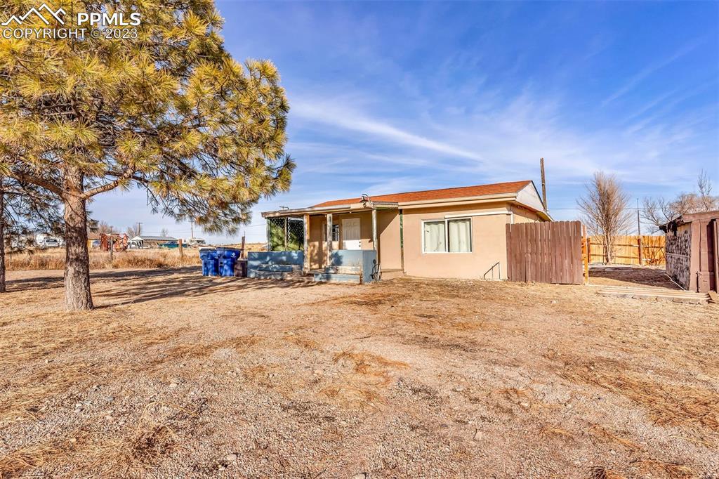 1417 2nd Road Pueblo, CO 81007 - Photo 1 of 32 a view of a house with a snow in the yard