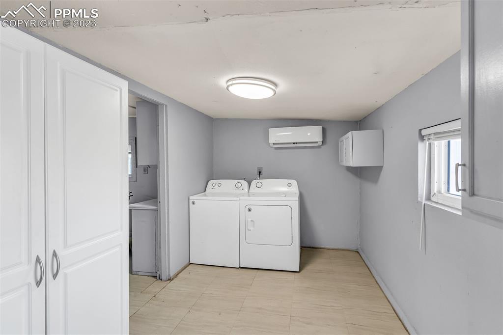 1417 2nd Road Pueblo, CO 81007 - Photo 11 of 32 a utility room with dryer and washer