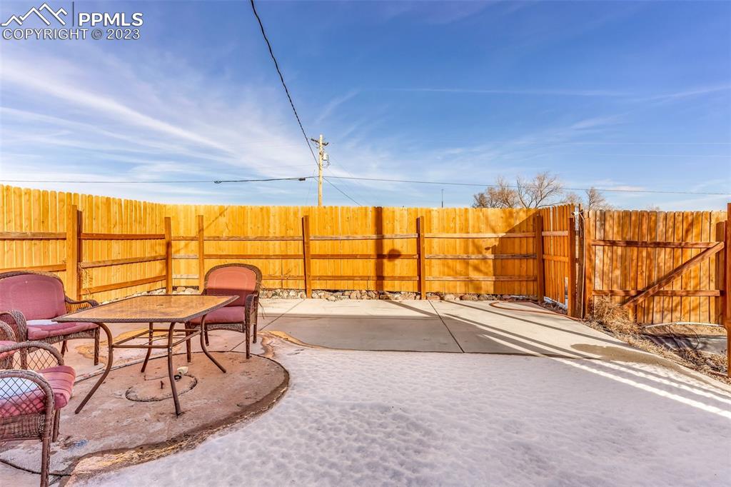 1417 2nd Road Pueblo, CO 81007 - Photo 16 of 32 a view of a swimming pool and outdoor seating