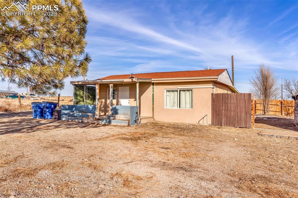 1417 2nd Road Pueblo, CO 81007 - Photo 2 of 32 a view of a house with a patio