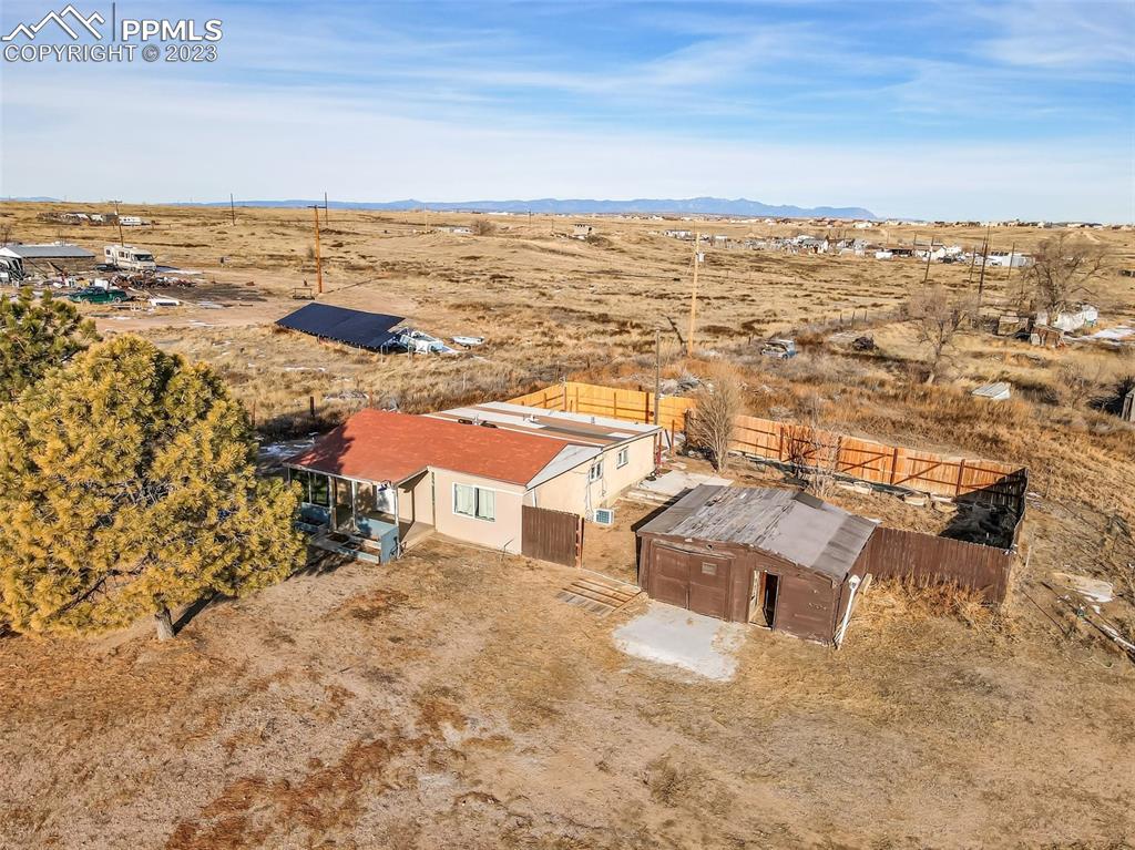 1417 2nd Road Pueblo, CO 81007 - Photo 21 of 32 an aerial view of residential houses with outdoor space