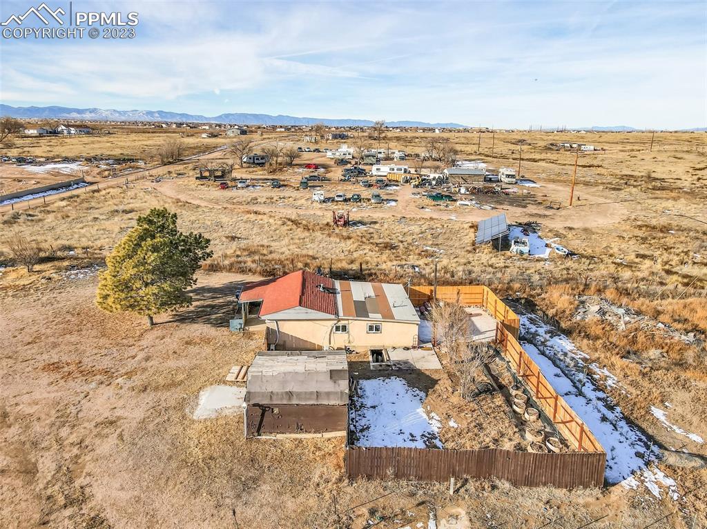 1417 2nd Road Pueblo, CO 81007 - Photo 23 of 32 an aerial view of residential houses with outdoor space