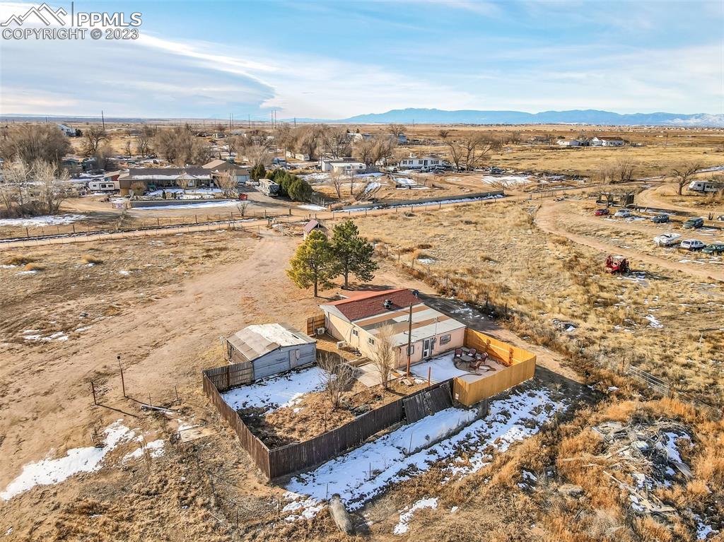 1417 2nd Road Pueblo, CO 81007 - Photo 24 of 32 an aerial view of residential houses with outdoor space