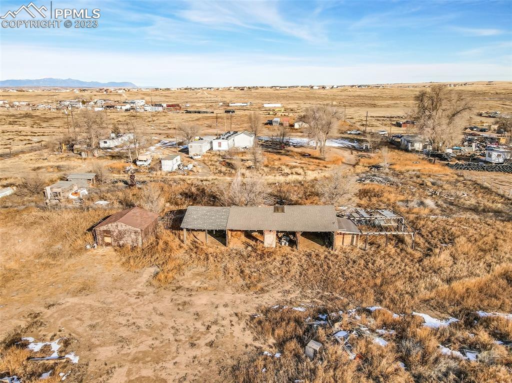 1417 2nd Road Pueblo, CO 81007 - Photo 26 of 32 an aerial view of residential houses with outdoor space