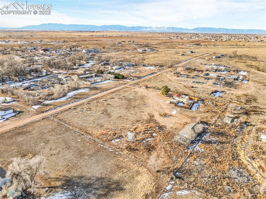 1417 2nd Road Pueblo, CO 81007 - Photo 27 of 32 an aerial view of residential houses with outdoor space