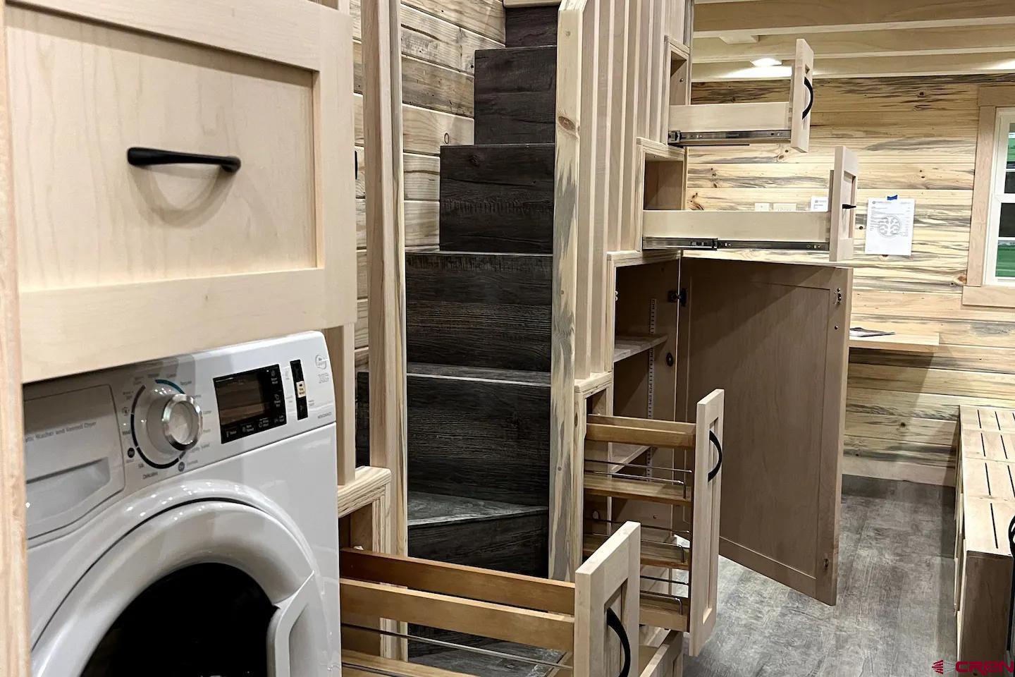 22130 6850 Road, Unit 212 Montrose, CO 81403 - Photo 8 of 29 a view of livingroom with washer and dryer