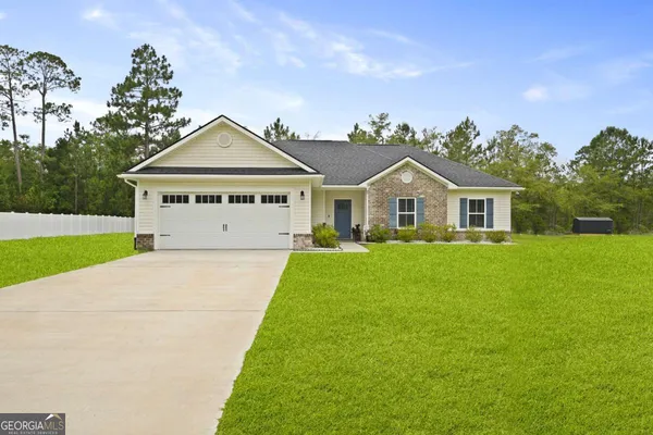 a view of house with garden
