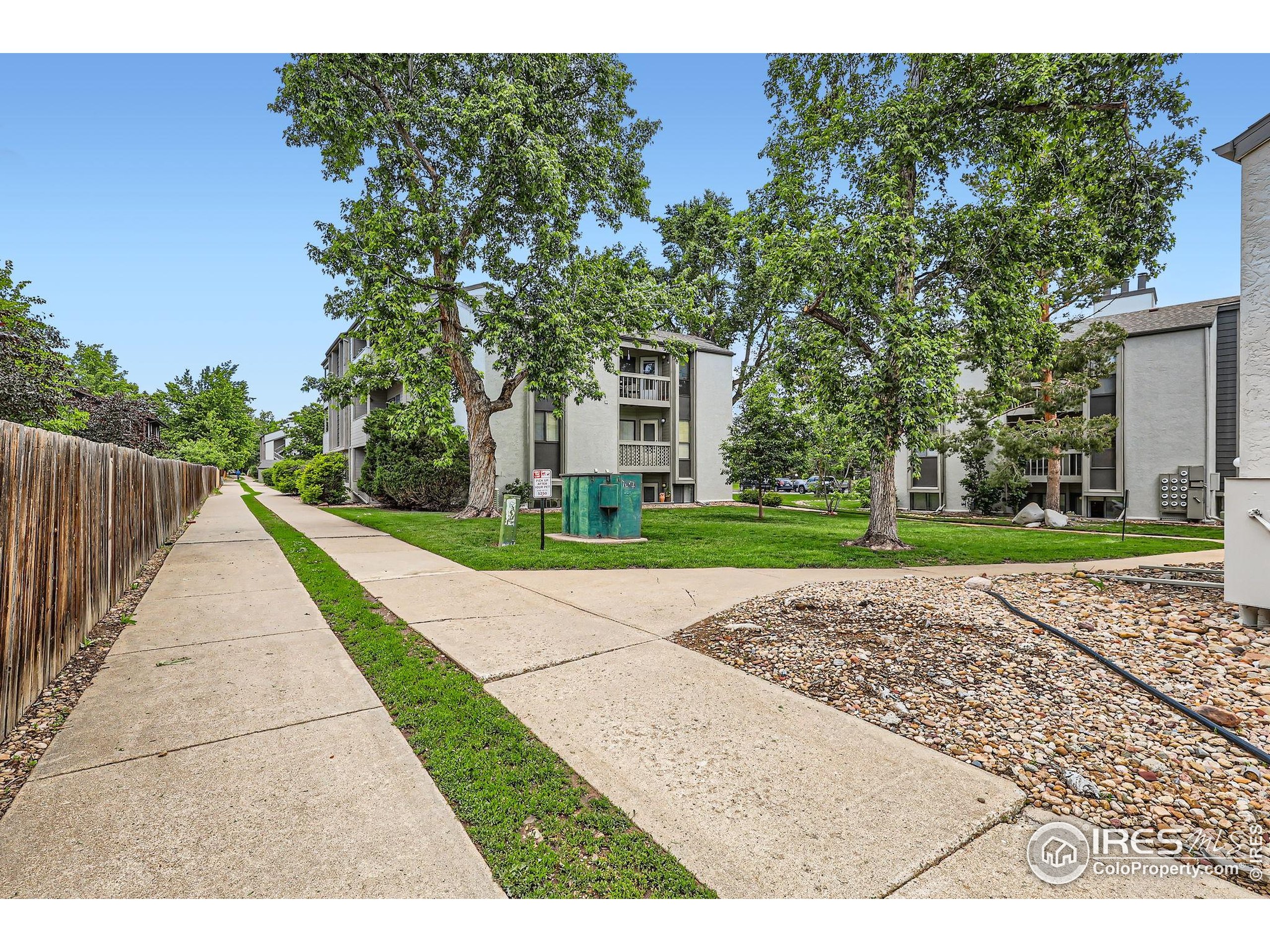 3515 28th Street, Unit 108 Boulder, CO 80301 - Photo 26 of 29 a view of a backyard with a garden