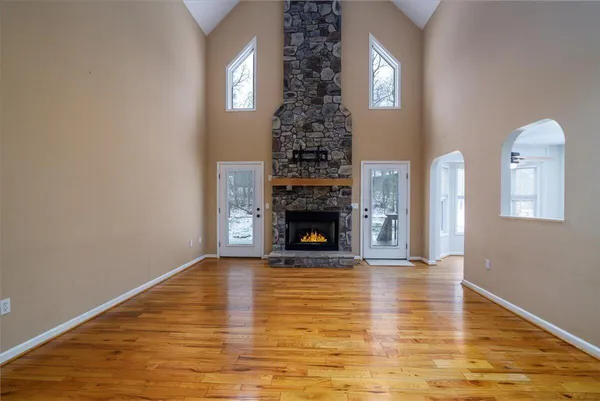 a kitchen with stainless steel appliances granite countertop a stove sink and cabinets