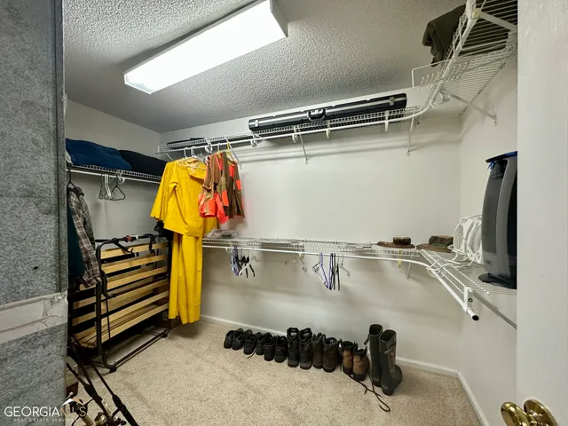 a bathroom with a tub and a shower