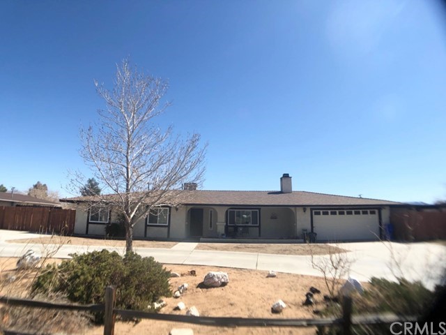 14535 Hopi Road Apple Valley, CA 92307 - Photo 1 of 1 a view of a back yard of the house