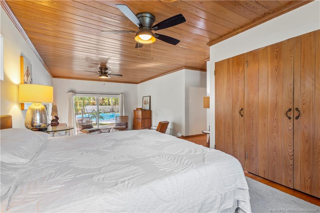 1001 South 11th Street Fort Pierce, FL 34950 - Photo 28 of 80 a large bed sitting in a room next to a window