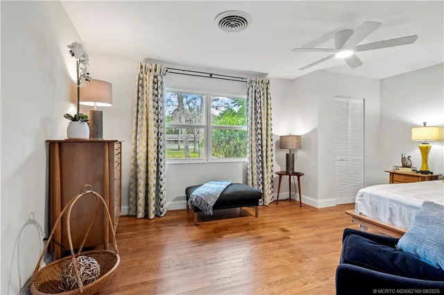 a bedroom with a bed and furniture