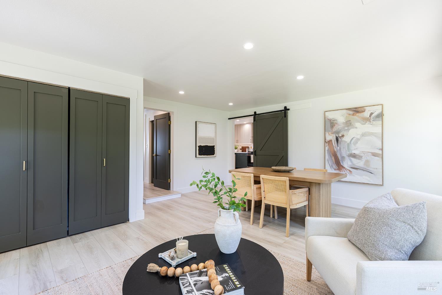14734 Young Road Healdsburg, CA 95448 - Photo 25 of 47 a living room with furniture and a flat screen tv