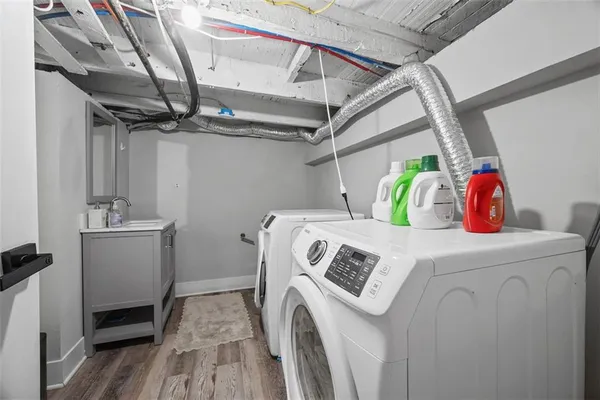 a utility room with dryer and washer