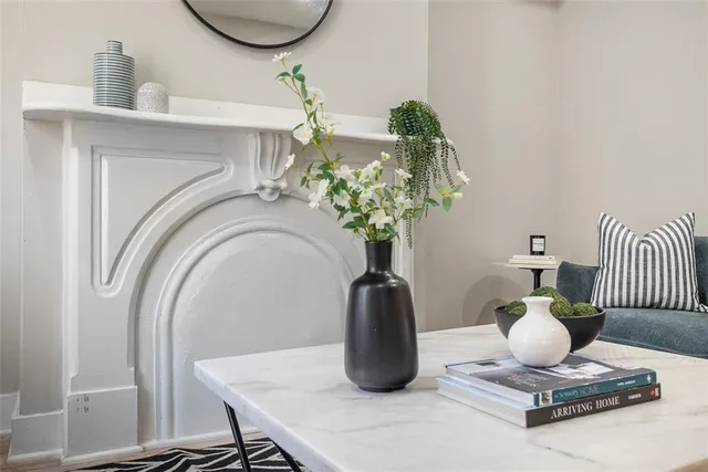 a vase of flowers sitting on a table