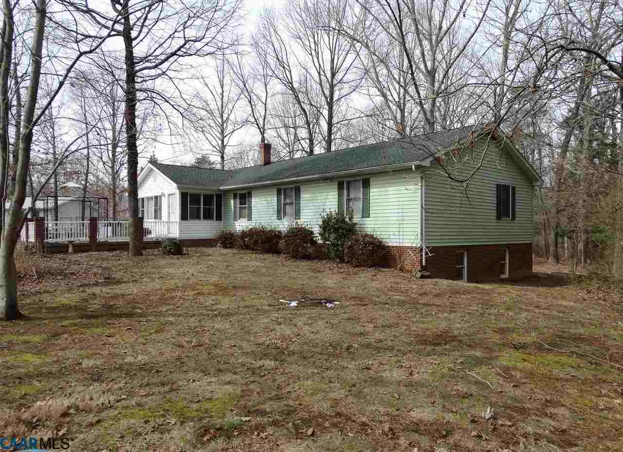 251 Oneals Road Pratts, VA 22731 - Photo 3 of 33 a front view of a house with garden