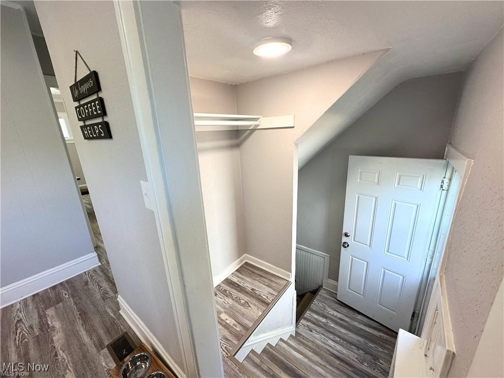 3277 Cedarbrook Road Cleveland, OH 44118 - Photo 16 of 18 Spacious closet with dark wood-style floors