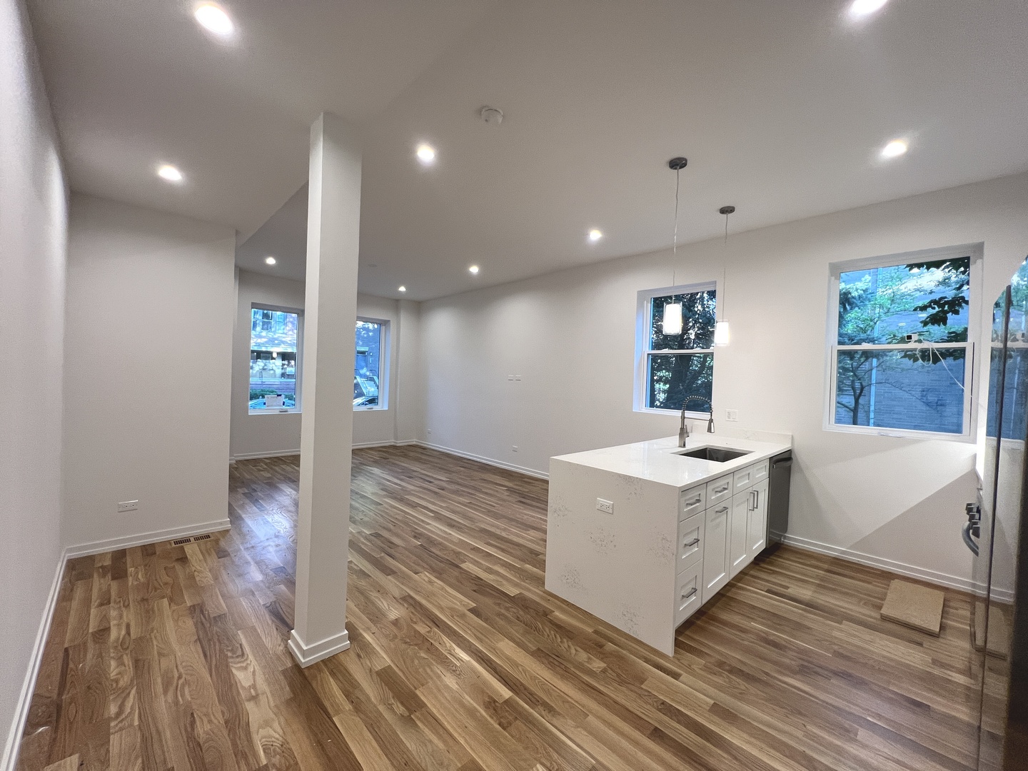 822 North Winchester Avenue, Unit 1F Chicago, IL 60622 - Photo 3 of 17 a view of kitchen with wooden floor and electronic appliances