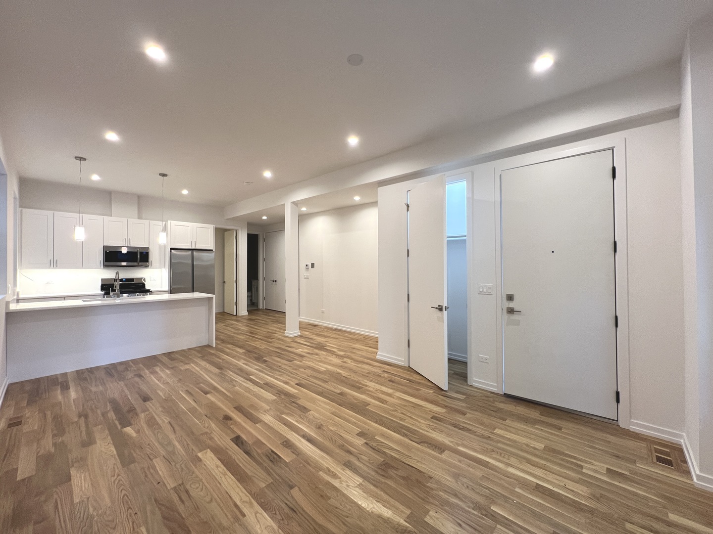 822 North Winchester Avenue, Unit 1F Chicago, IL 60622 - Photo 4 of 17 a view of kitchen with wooden floor