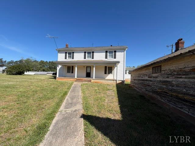 439 Midgett Farm Road Concord, VA 24538 - Photo 3 of 27 a front view of a house with a yard