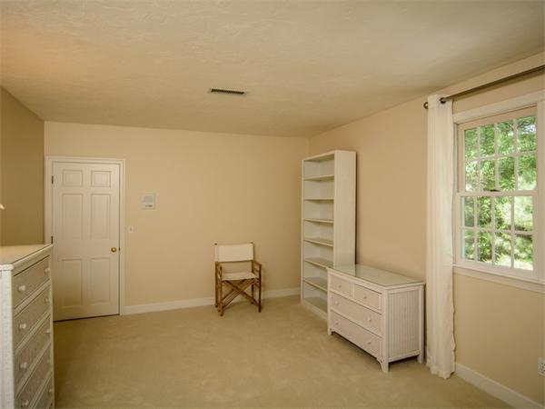 8 Stratton Drive Westborough, MA 01581 - Photo 21 of 30 a view of room with chair and dryer