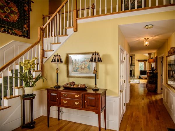 8 Stratton Drive Westborough, MA 01581 - Photo 3 of 30 a view of a hallway with wooden floor and staircase