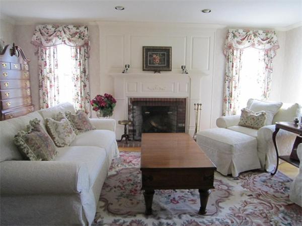 8 Stratton Drive Westborough, MA 01581 - Photo 4 of 30 a living room with furniture a fireplace and a table