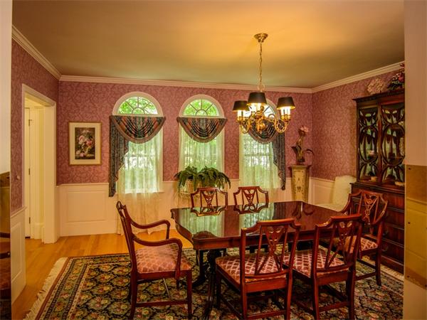 8 Stratton Drive Westborough, MA 01581 - Photo 6 of 30 a view of a dining room with furniture and chandelier