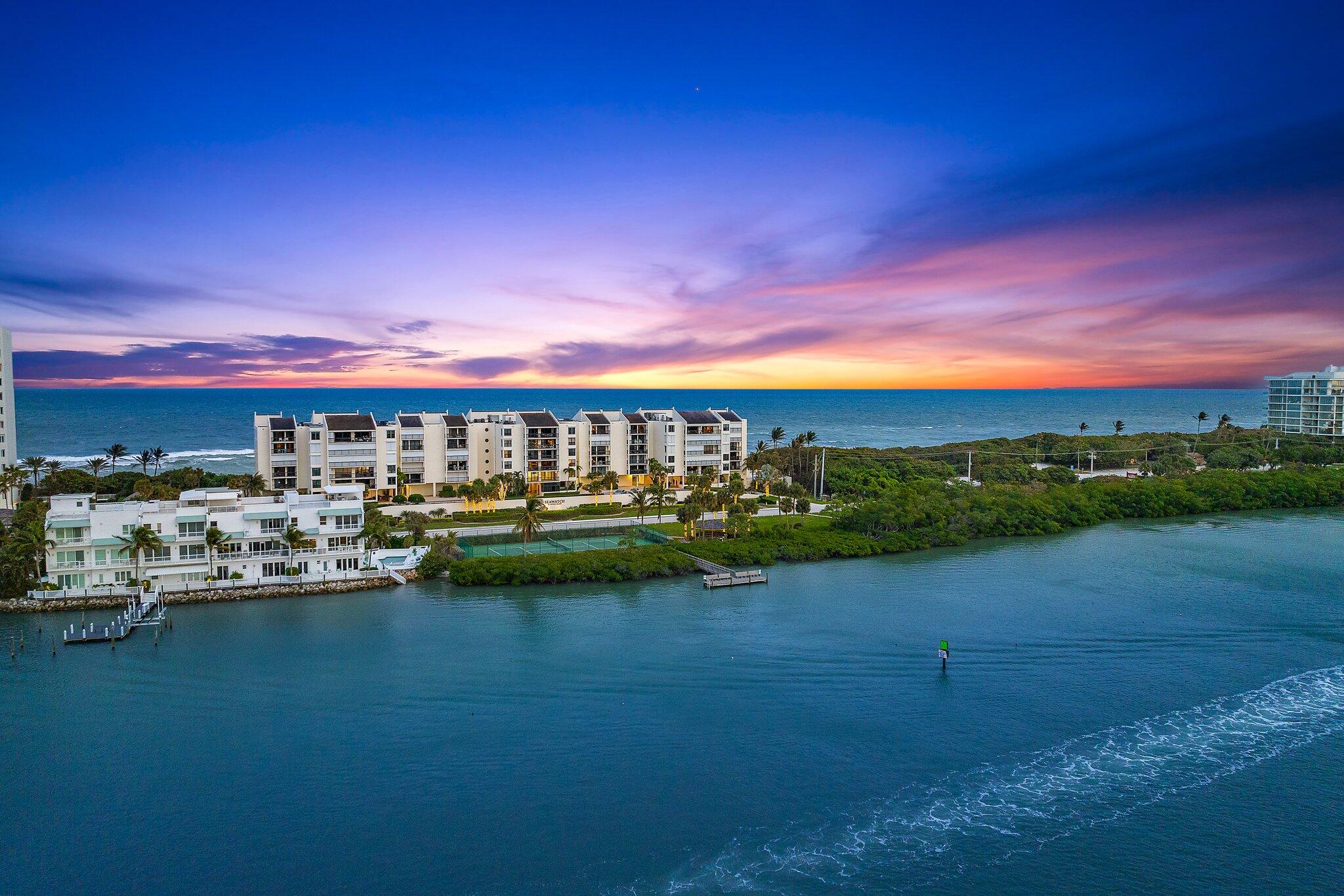 19670 South Beach Road, Unit B303 Jupiter, FL 33469 - Photo 80 of 104 a view of a lake with houses in the back