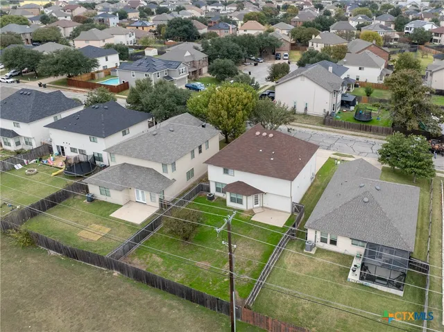 an aerial view of a house with a garden