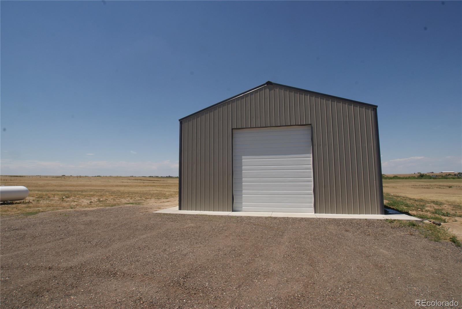6955 Yulle Road Bennett, CO 80102 - Photo 11 of 16 a view of an empty room