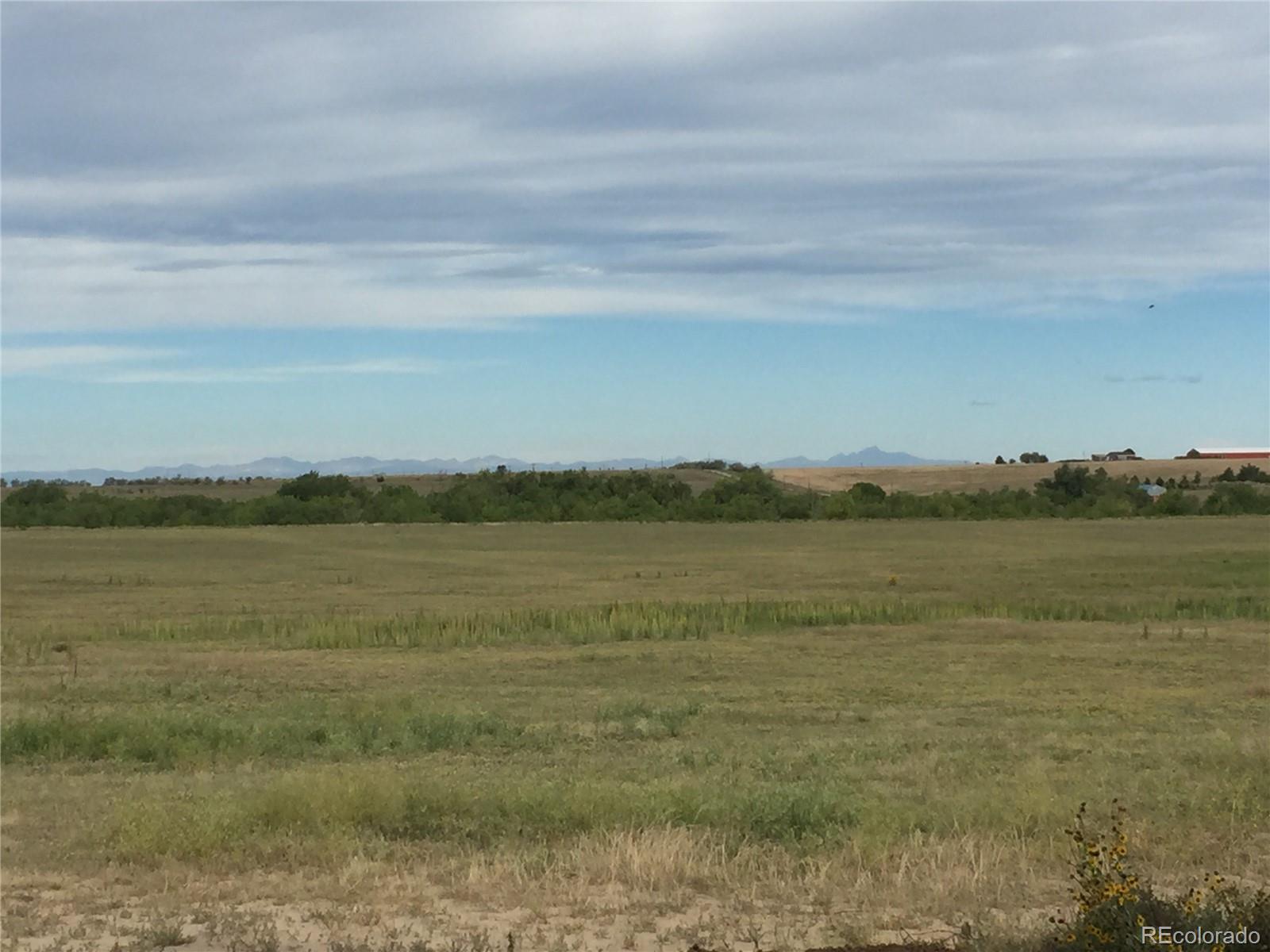 6955 Yulle Road Bennett, CO 80102 - Photo 15 of 16 a view of a lake view