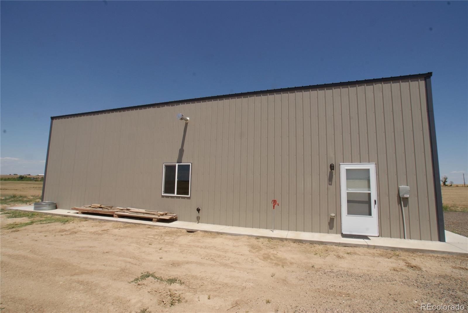 6955 Yulle Road Bennett, CO 80102 - Photo 4 of 16 a view of an empty room