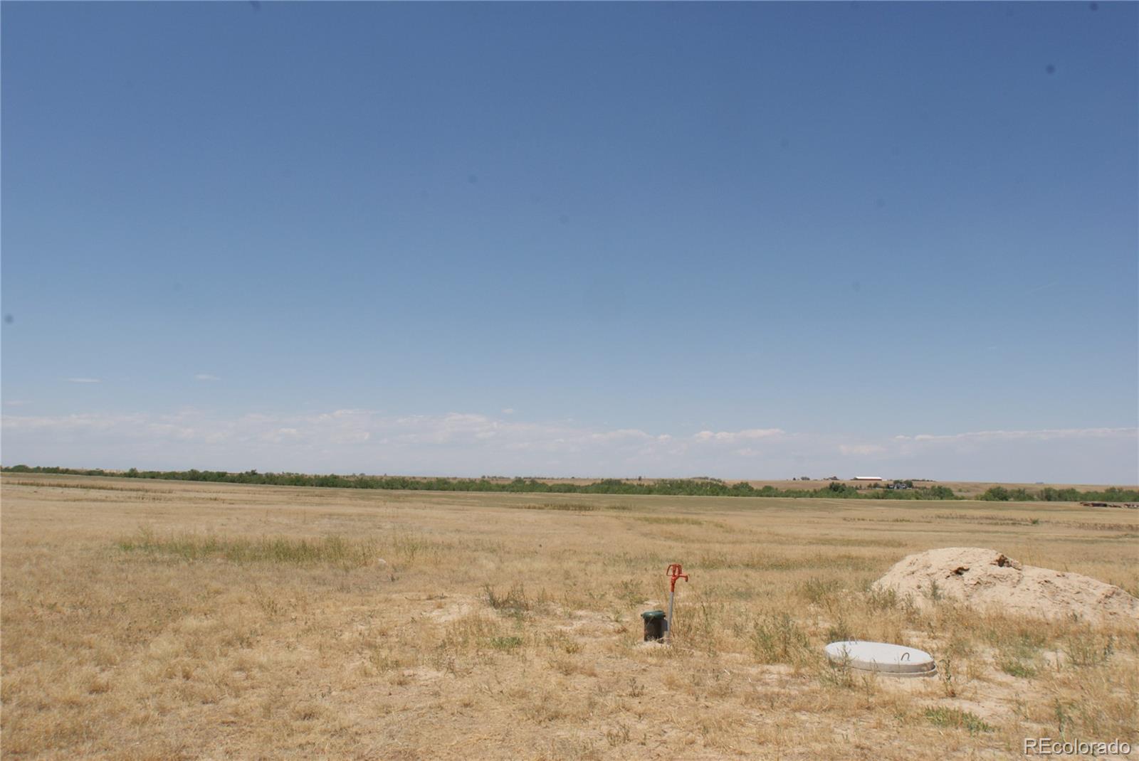 6955 Yulle Road Bennett, CO 80102 - Photo 7 of 16 a view of a ocean view