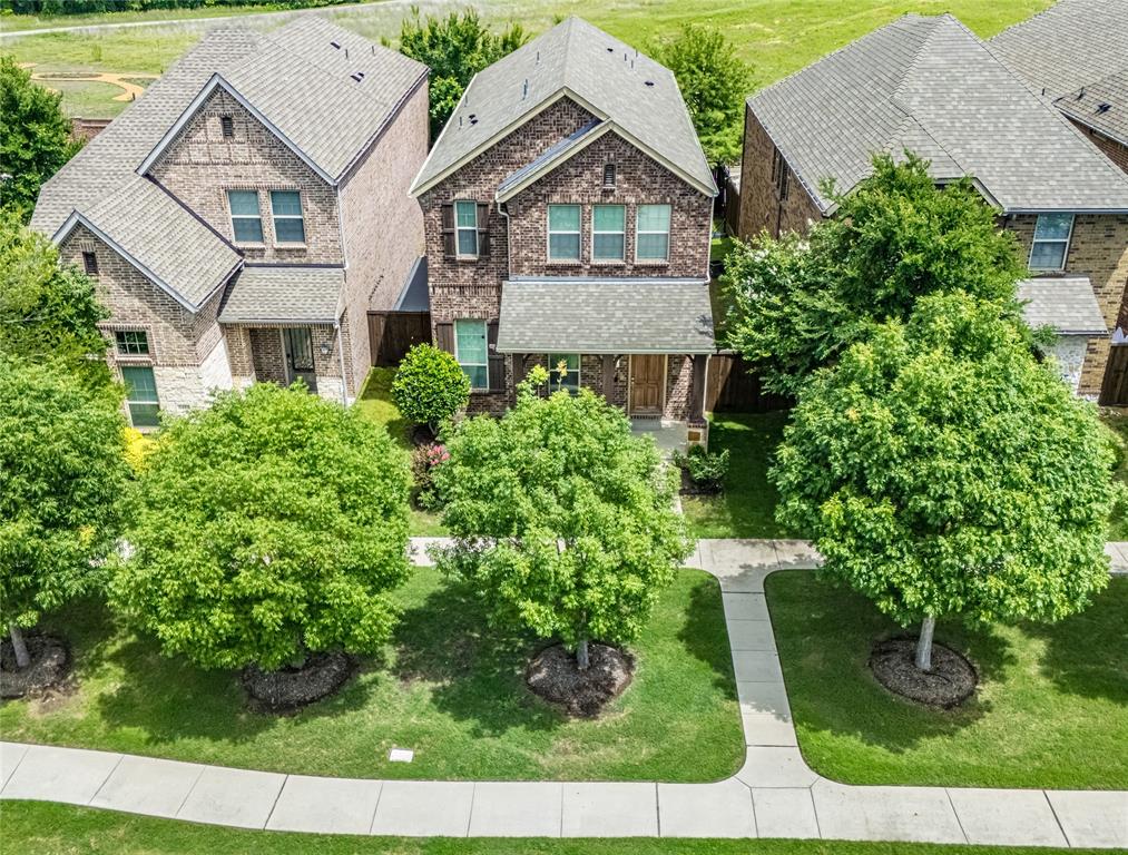 1448 Pebble Way Allen, TX 75013 - Photo 19 of 25 an aerial view of a house with a yard