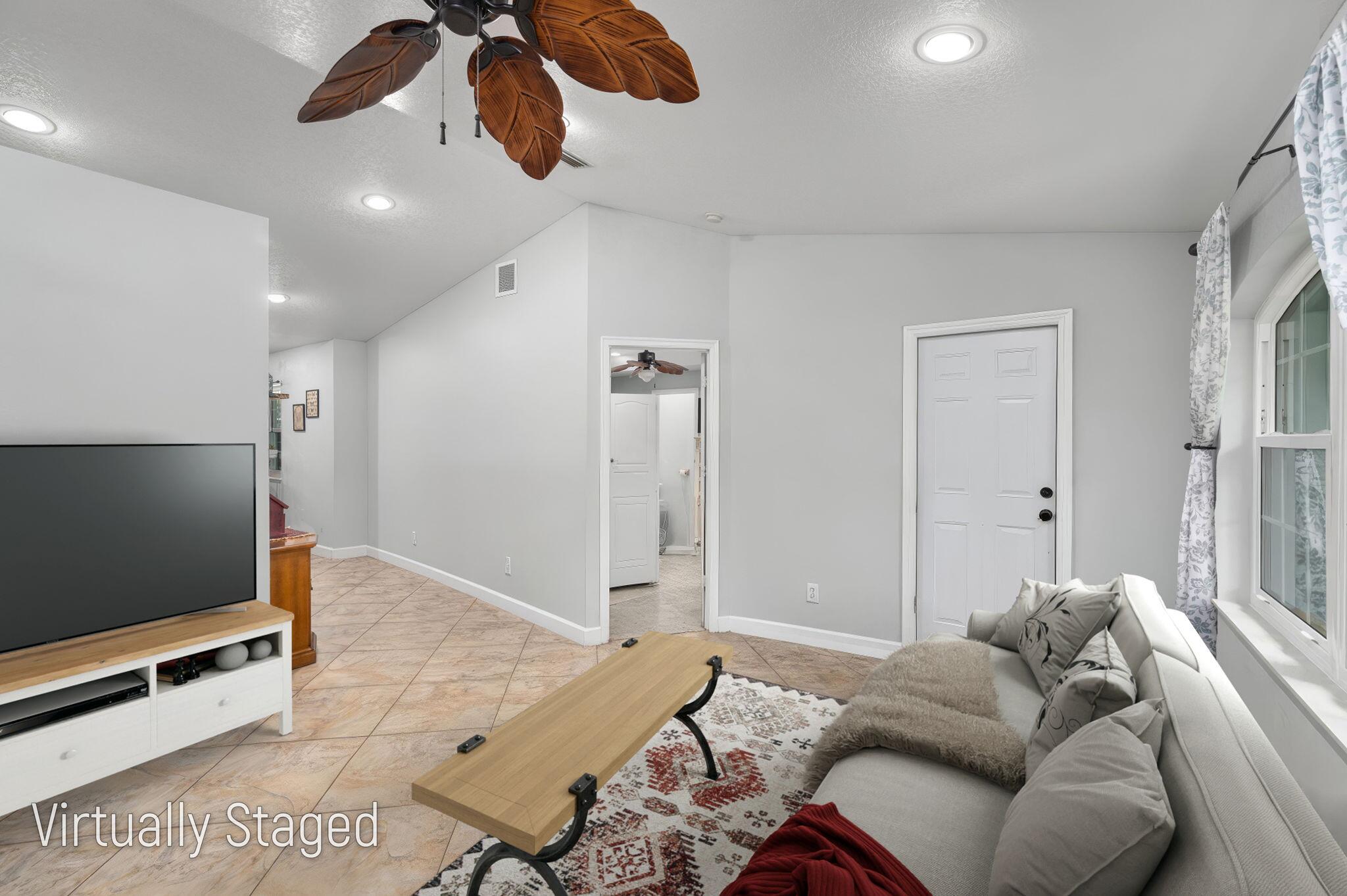 606 Gregory Street Fort Pierce, FL 34982 - Photo 6 of 27 Virtually Staged Living Room 2 Web